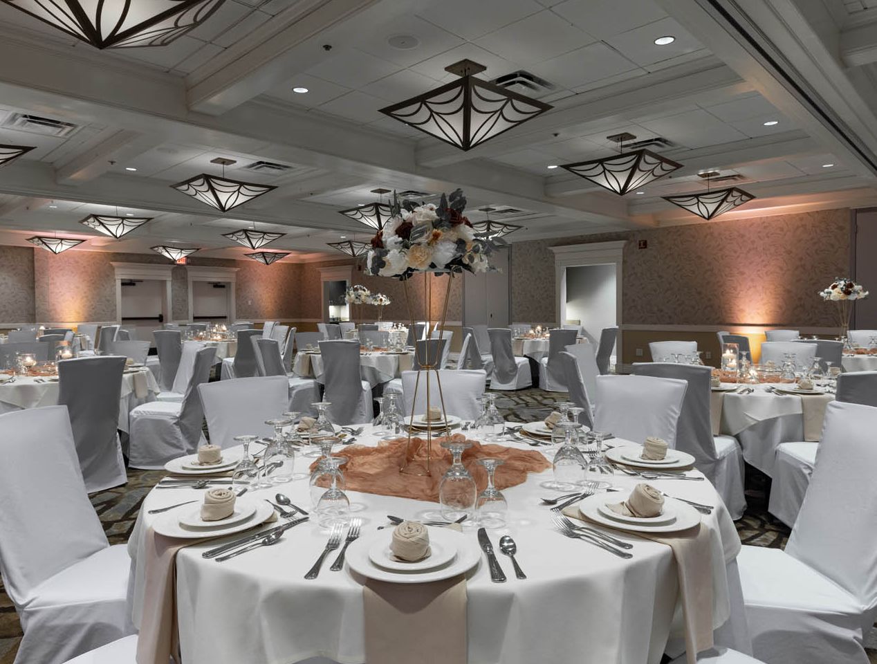 The Hotel Ithaca's massive ballroom set up for a formal wedding