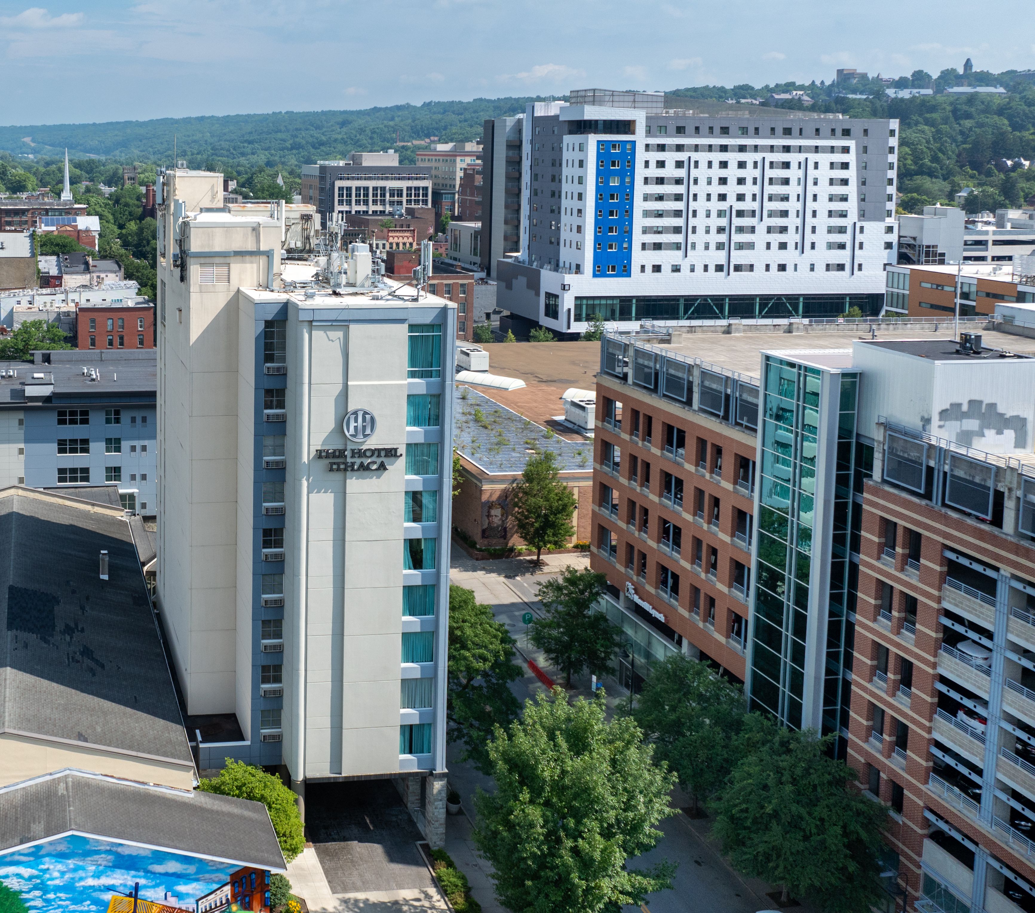 An aerial view of The Hotel Ithaca with the Ithaca Downtown Conference Center visible in the background